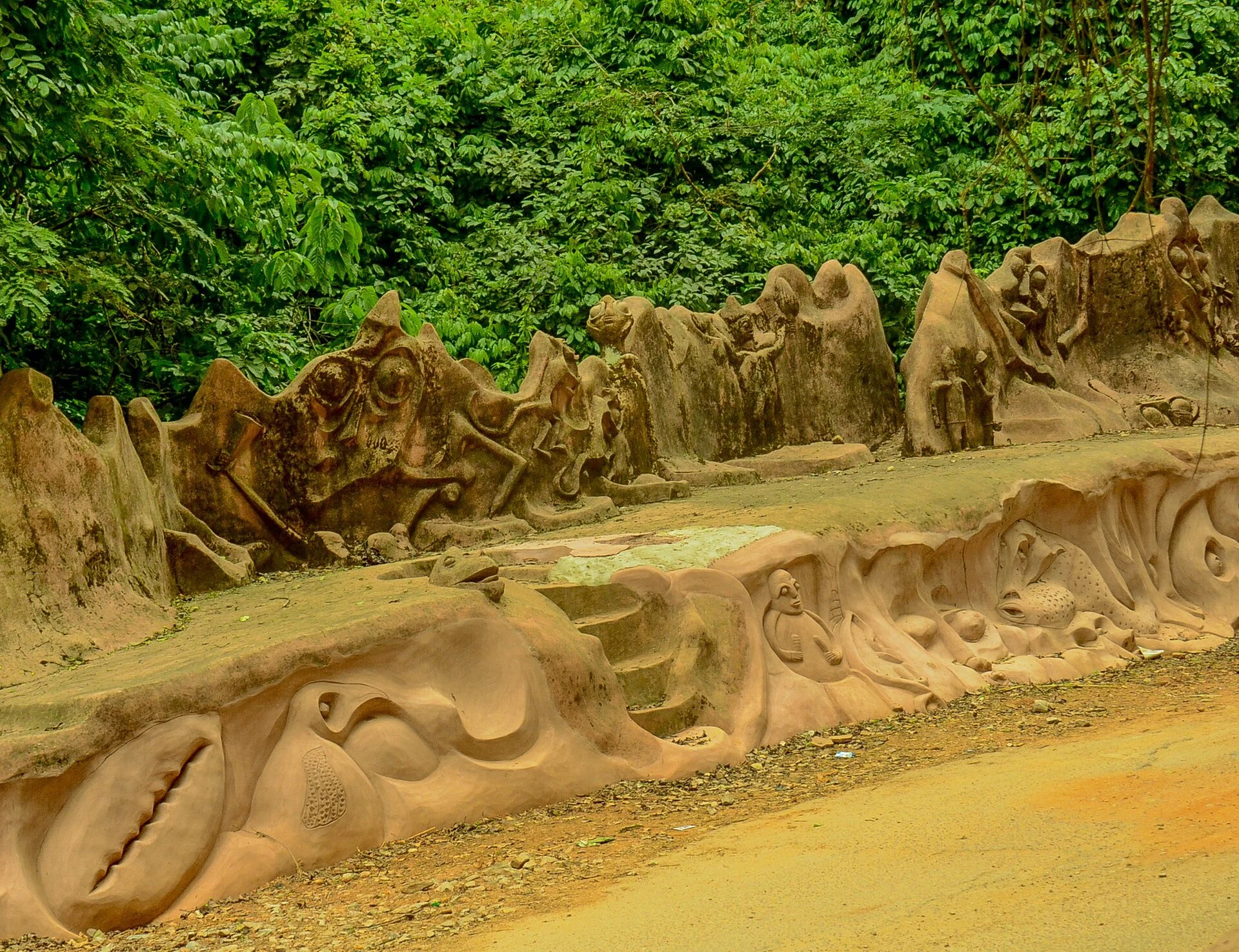 Osun River among riparian vegetation inside the Osun-Osogbo Sacred Grove.