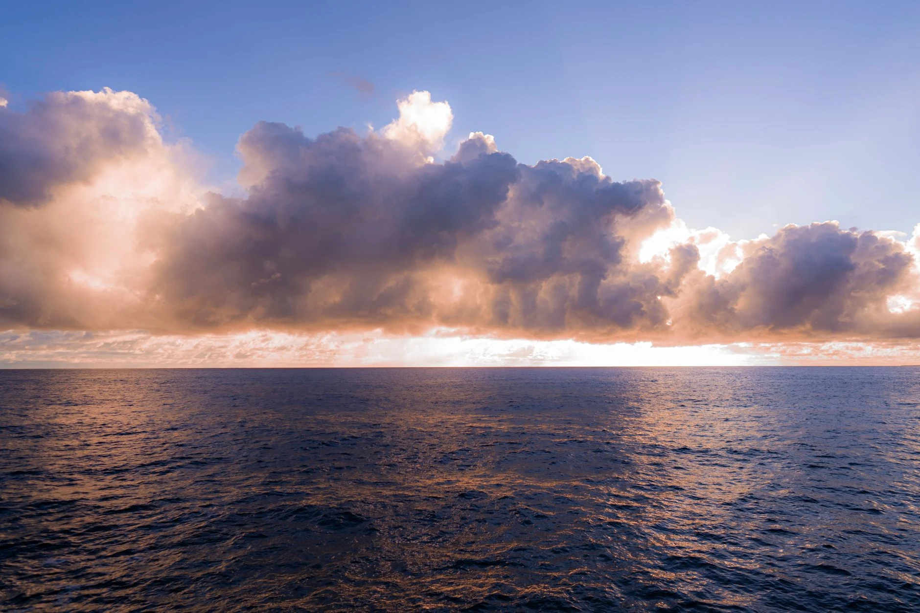 Ocean-horizon context image; it does not depict an identifiable view of Palau.