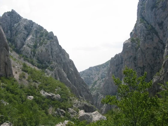 Walking trail between limestone walls in Velika Paklenica canyon, Paklenica National Park.