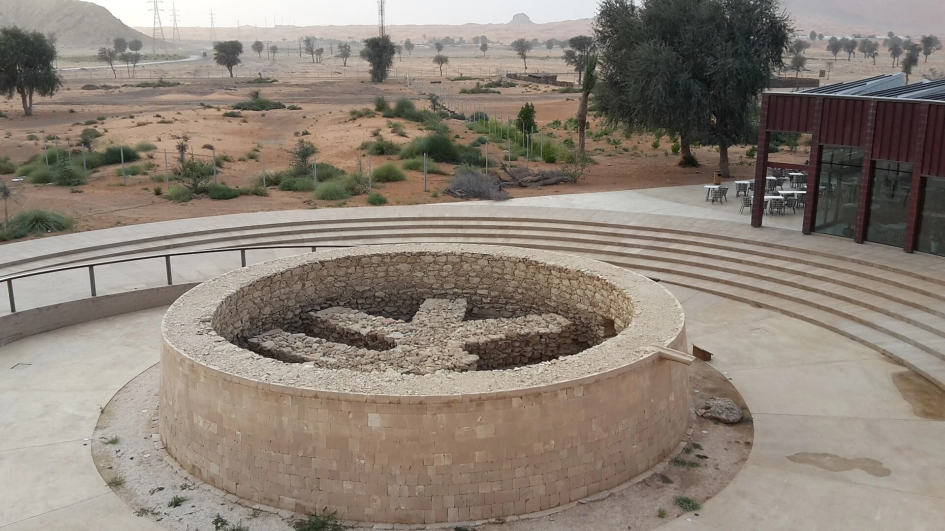 Exterior of Mleiha Archaeological Centre against Sharjah's desert landscape.