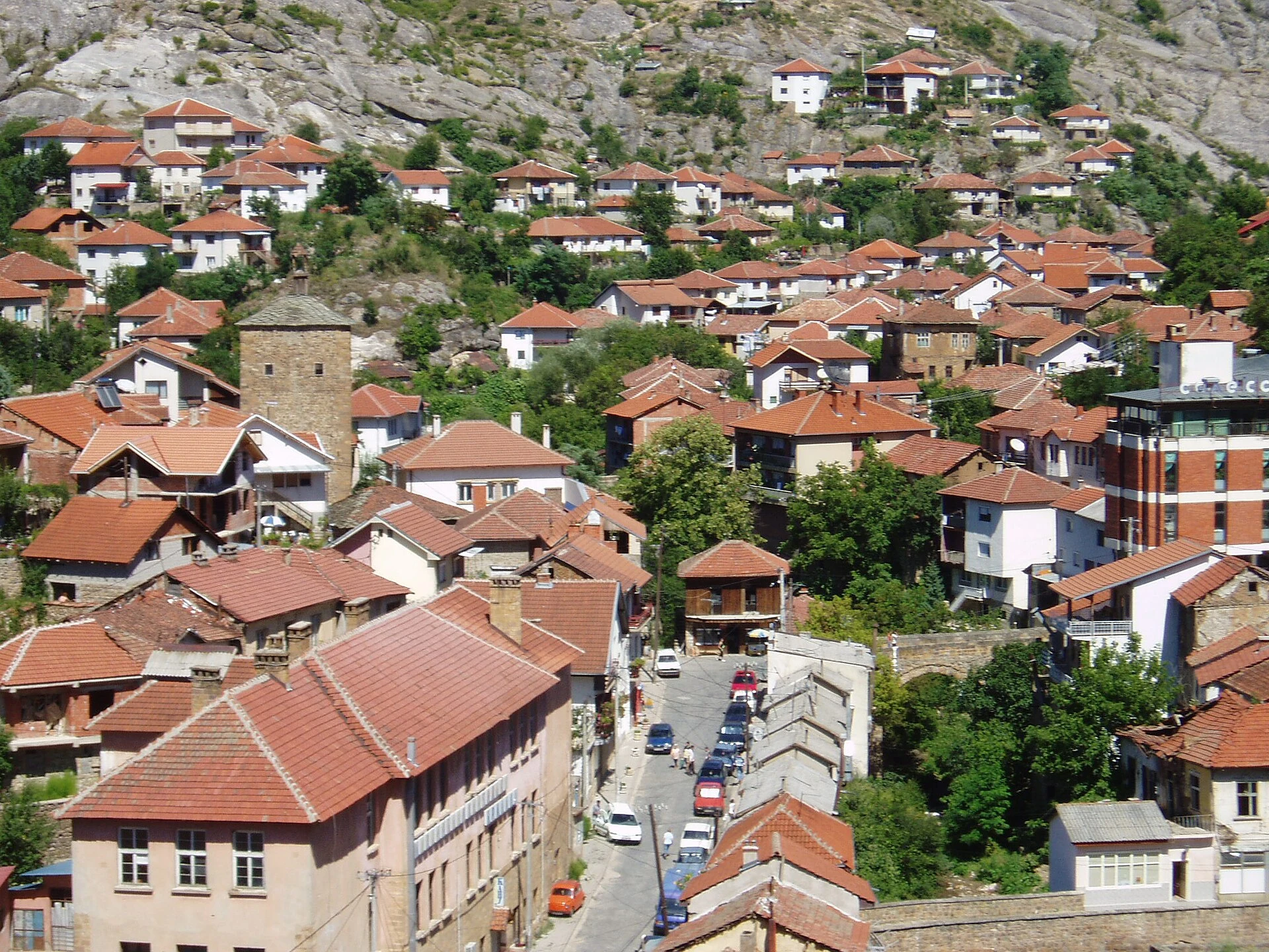 Stone bridge and hillside houses in Kratovo’s historic center.