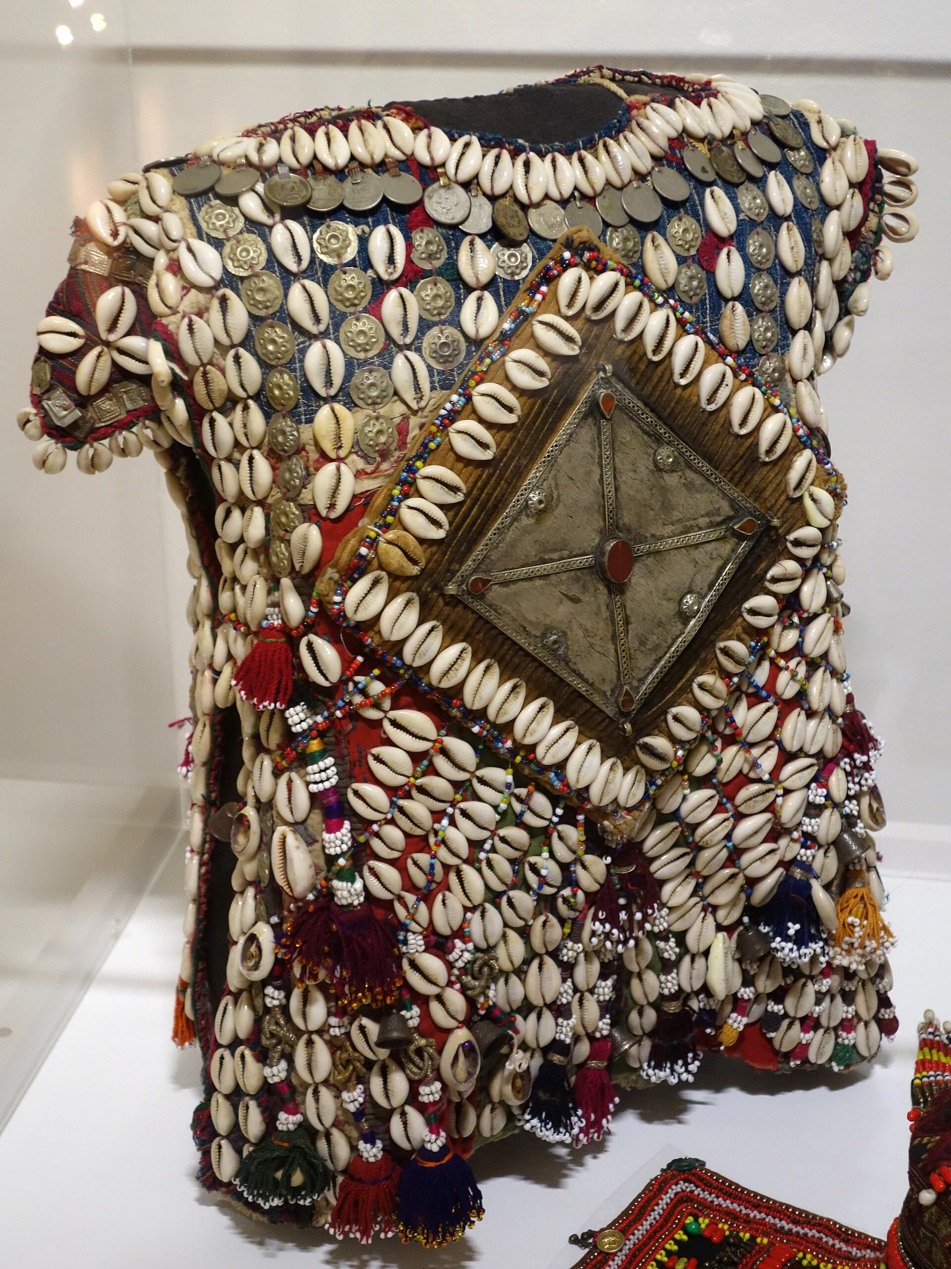 Afghan textile from a museum collection, used as cultural context.