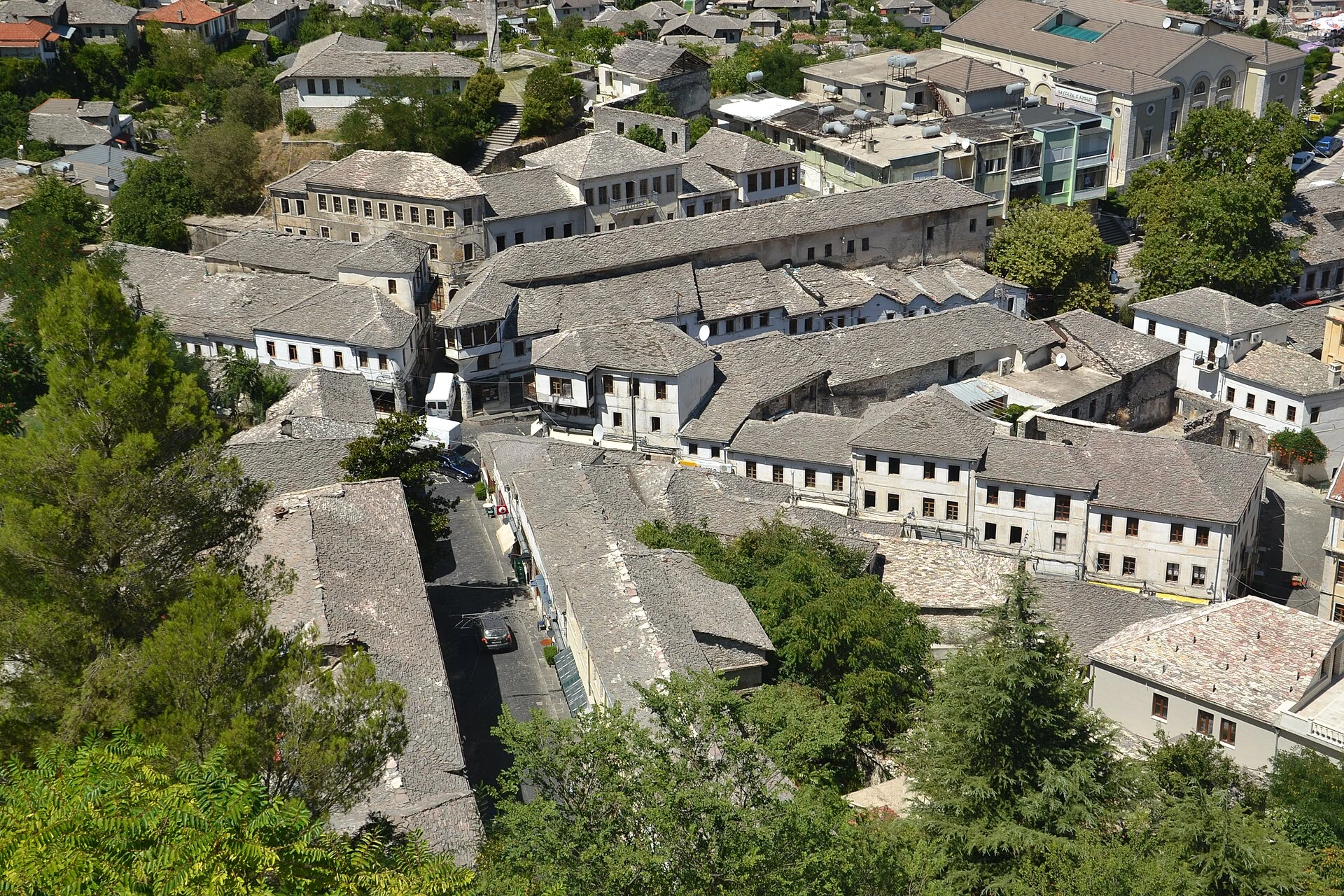 Stone façade and towers of Zekate House in Gjirokastër.