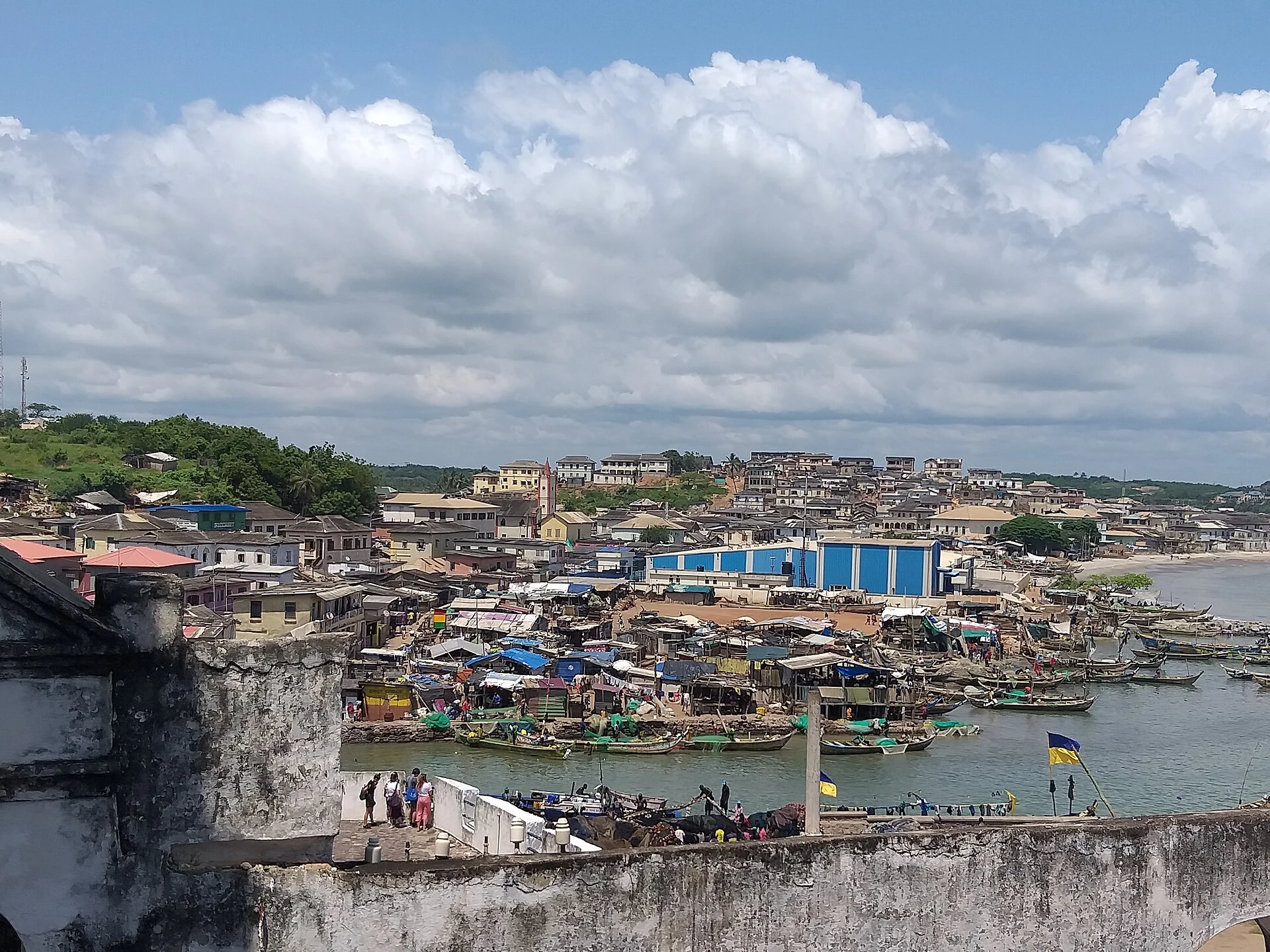 Fishing boats in Elmina harbour with St. George’s Castle behind.