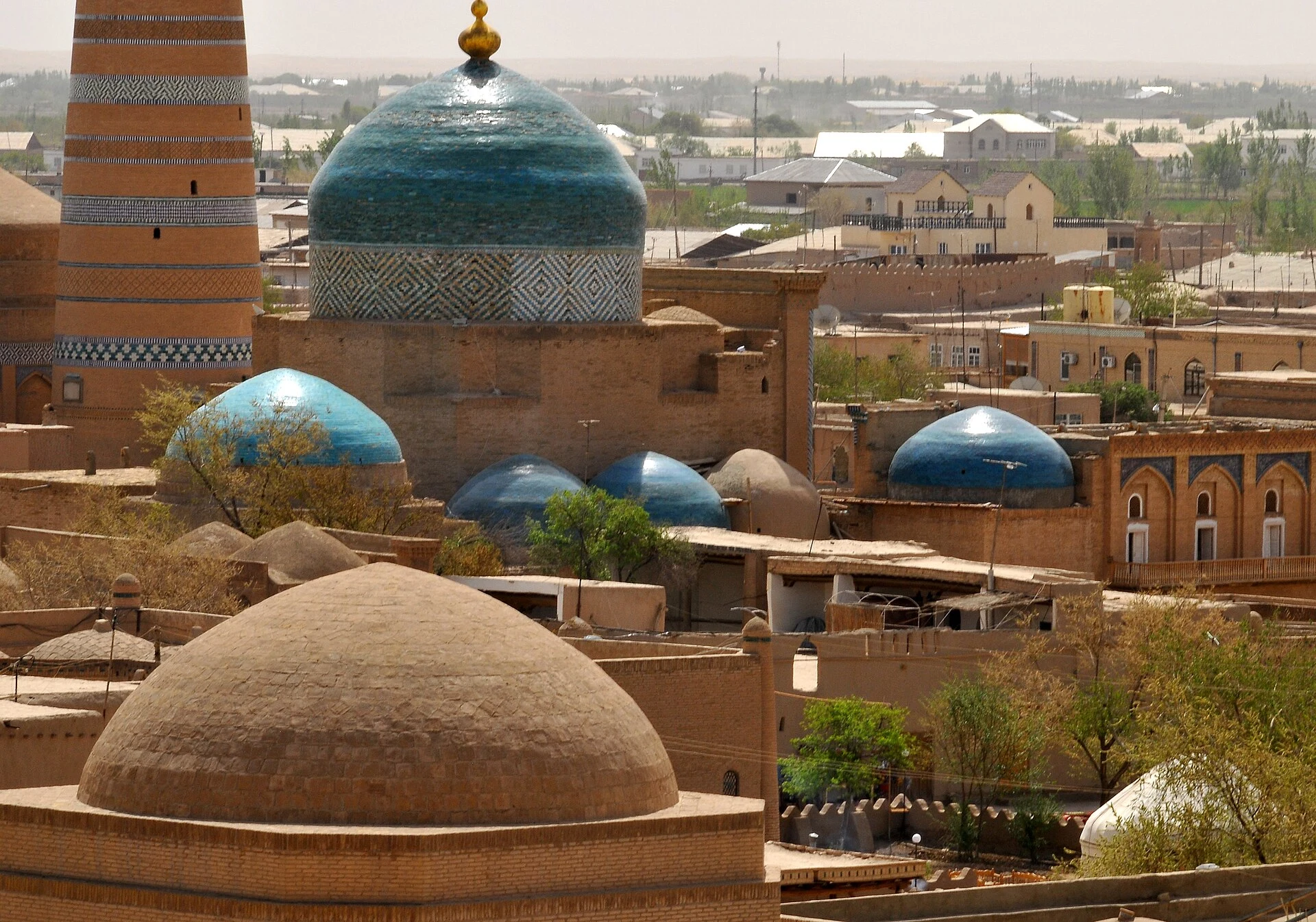 Earthen city wall and quiet lane in Itchan Kala, Khiva.