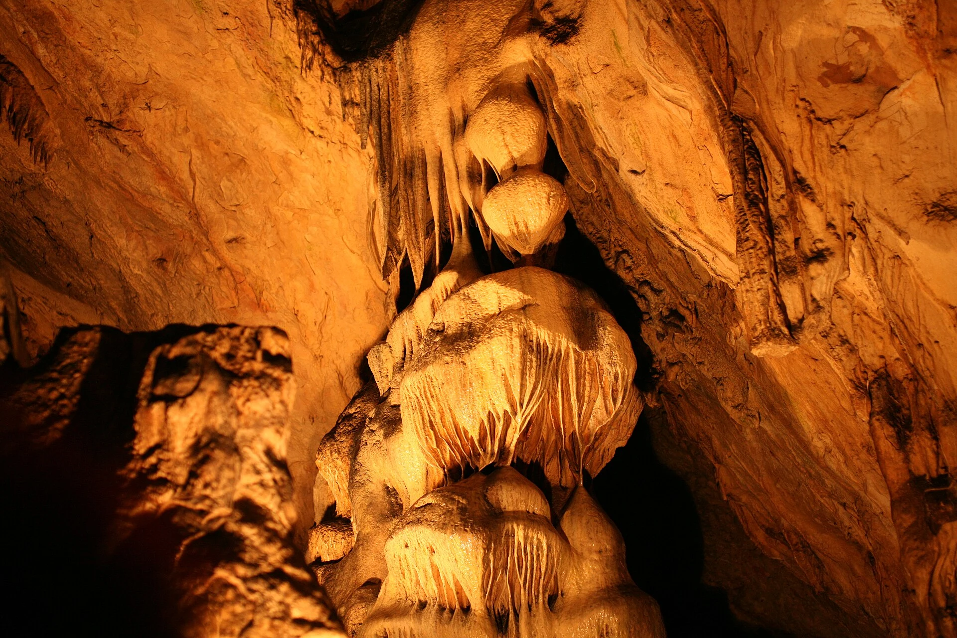 Prehistoric painted figures on a wall in Magura Cave.