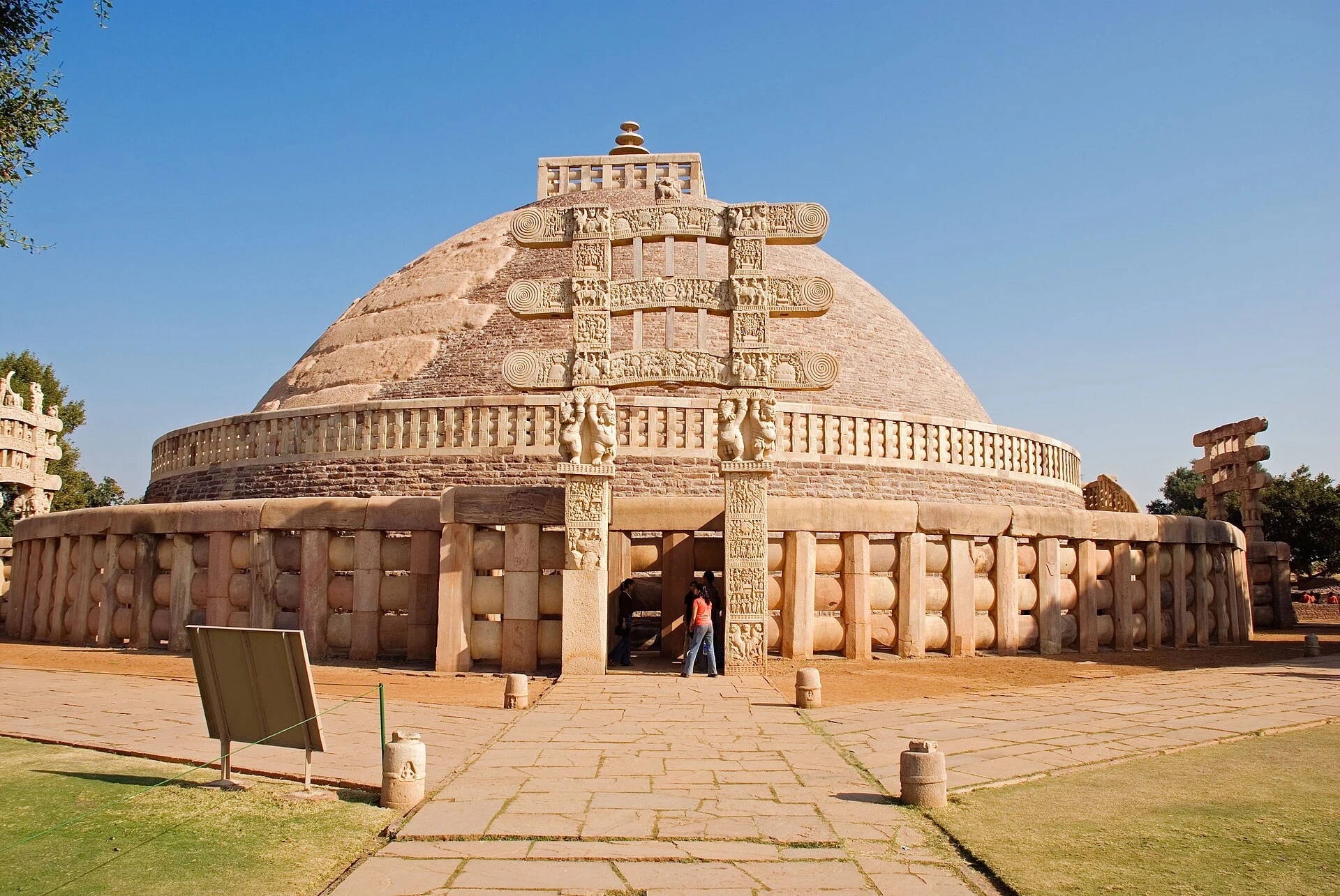 The Great Stupa at Sanchi with one carved gateway.
