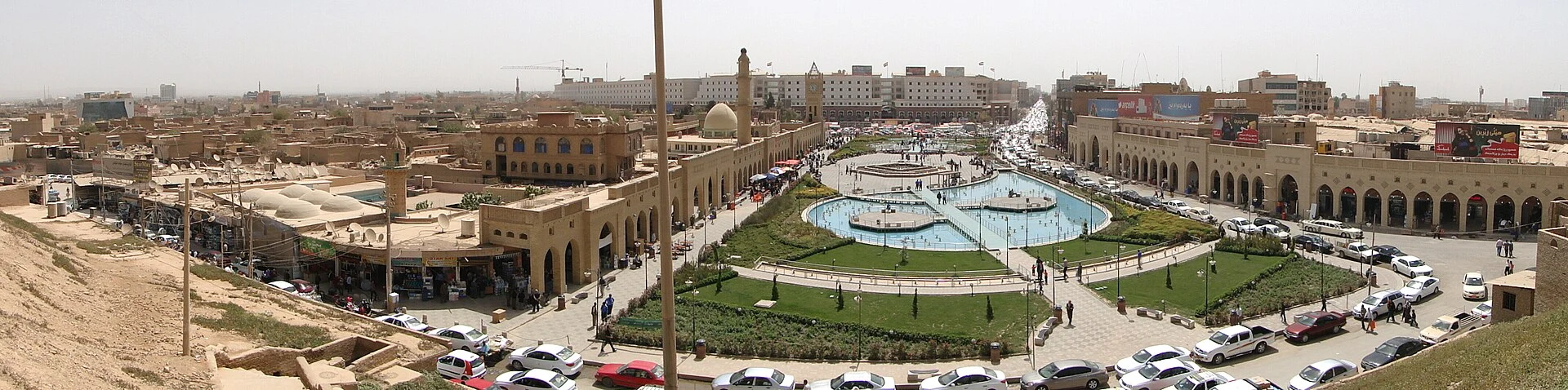Panoramic view of Erbil Citadel rising above the modern city.