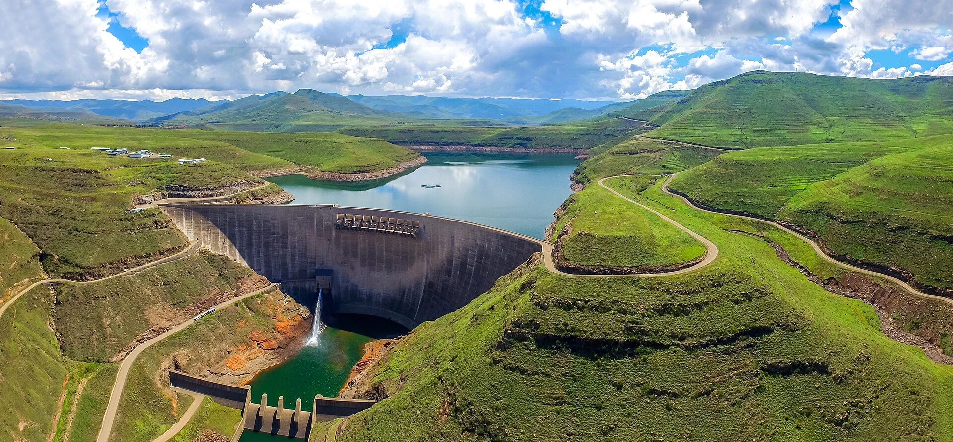 Concrete arch wall and reservoir of Katse Dam in the Lesotho highlands.