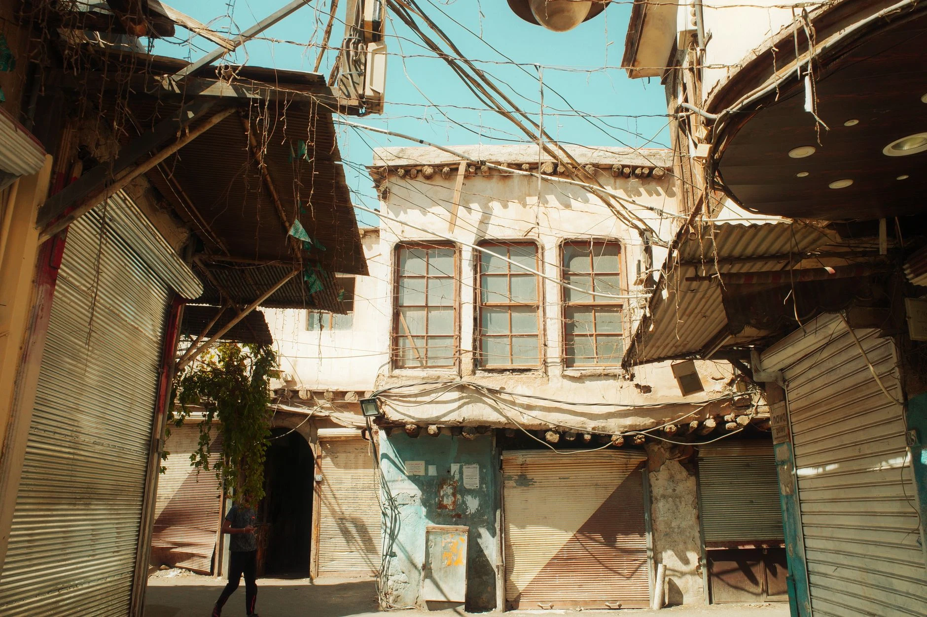 Stone lane and historic architecture in Damascus Old City.